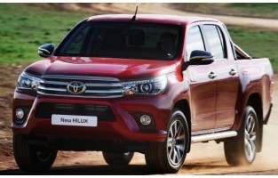 Vloermatten Toyota Hilux dubbele cabine (2018 - heden) logo Hybride